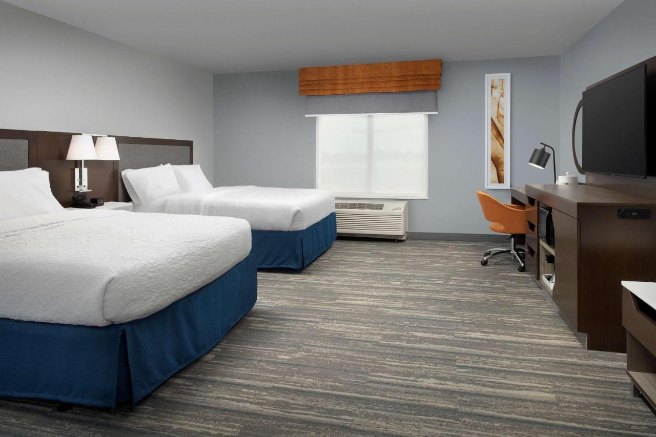 Queen Room with Two Queen Beds - Mobility Accessible with Roll-in Shower at Hampton Inn & Suites Rapid City Rushmore