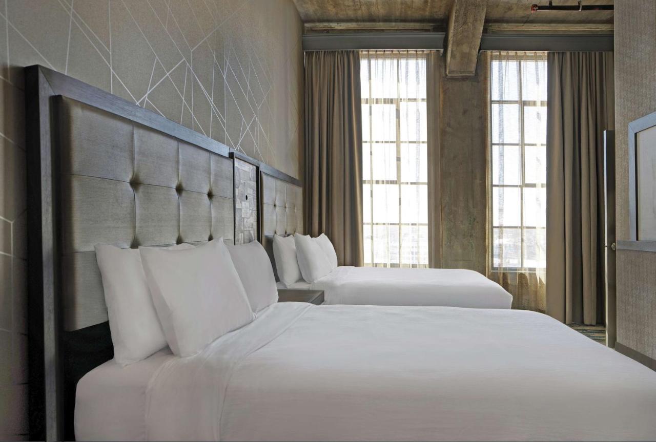 Queen Corner Suite with Two Queen Beds at Embassy Suites by Hilton Rockford Riverfront