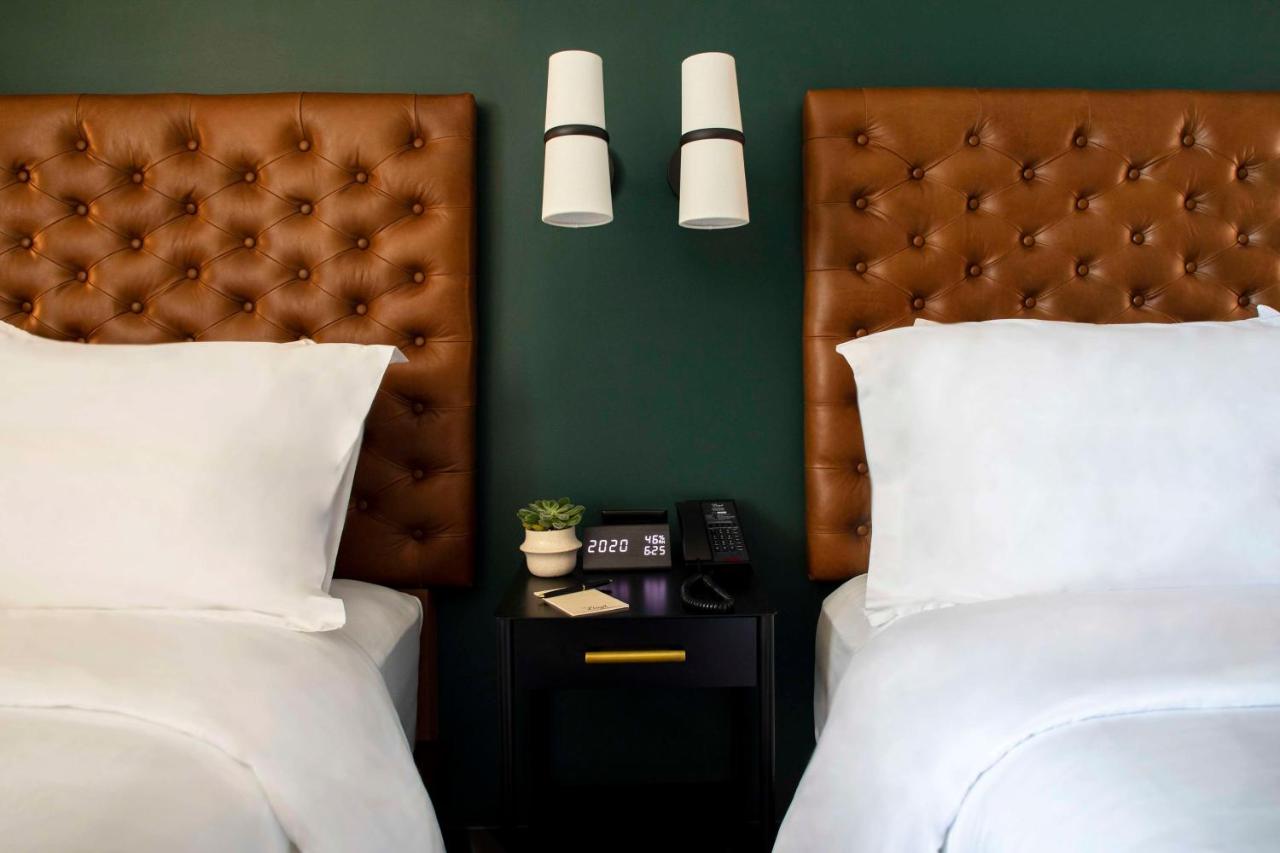 Queen Room with Two Queen Beds - Mobility/Hearing Accessible at The Lloyd Stamford, Tapestry Collection by Hilton