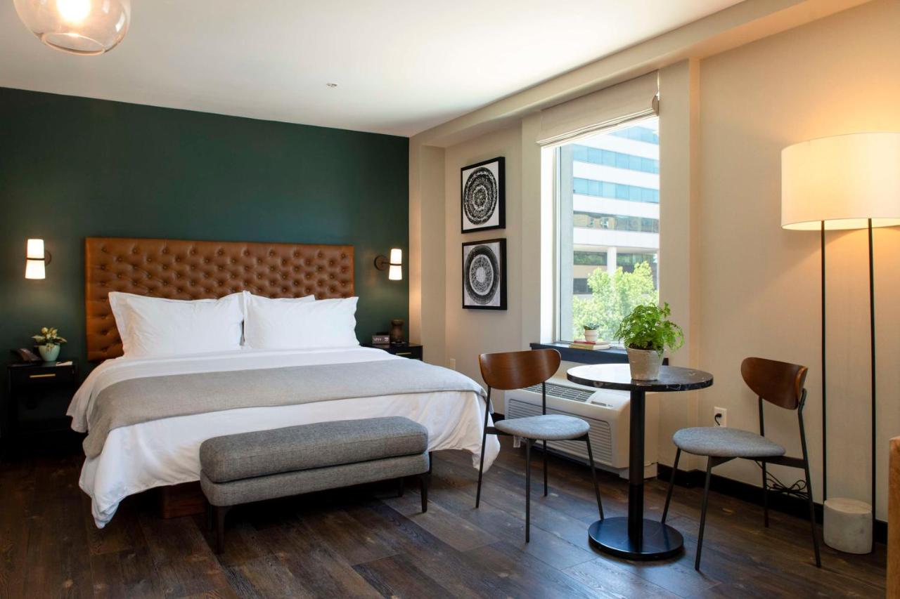 One-Bedroom King Suite at The Lloyd Stamford, Tapestry Collection by Hilton