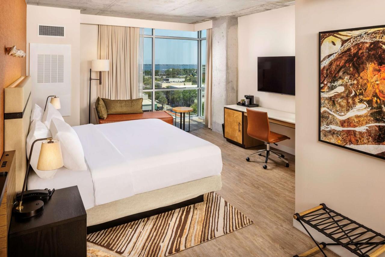 Corner King Room with Sofa Bed and City View at Hotel Melby Downtown Melbourne, Tapestry Collection by Hilton