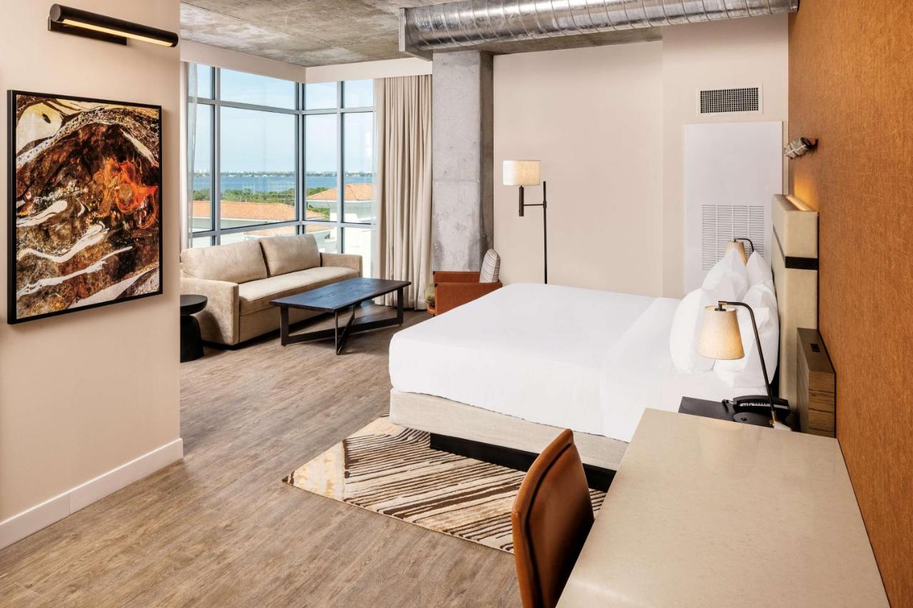 Corner King Room with Sofa Bed and Water View at Hotel Melby Downtown Melbourne, Tapestry Collection by Hilton
