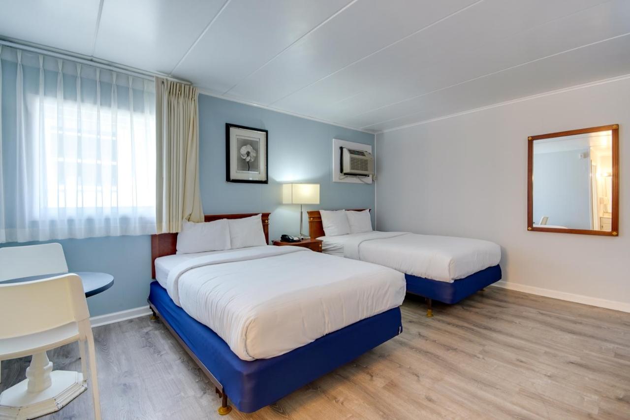 Double Room with Two King Beds with Balcony - Street View at Rideau Oceanfront Motel