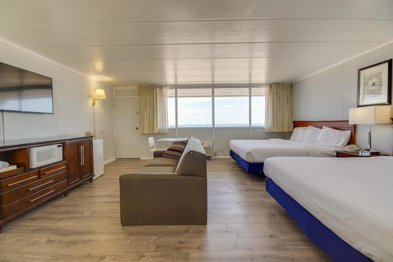 Large Ocean Front room with Two King Beds and Sofa Couch at Rideau Oceanfront Motel