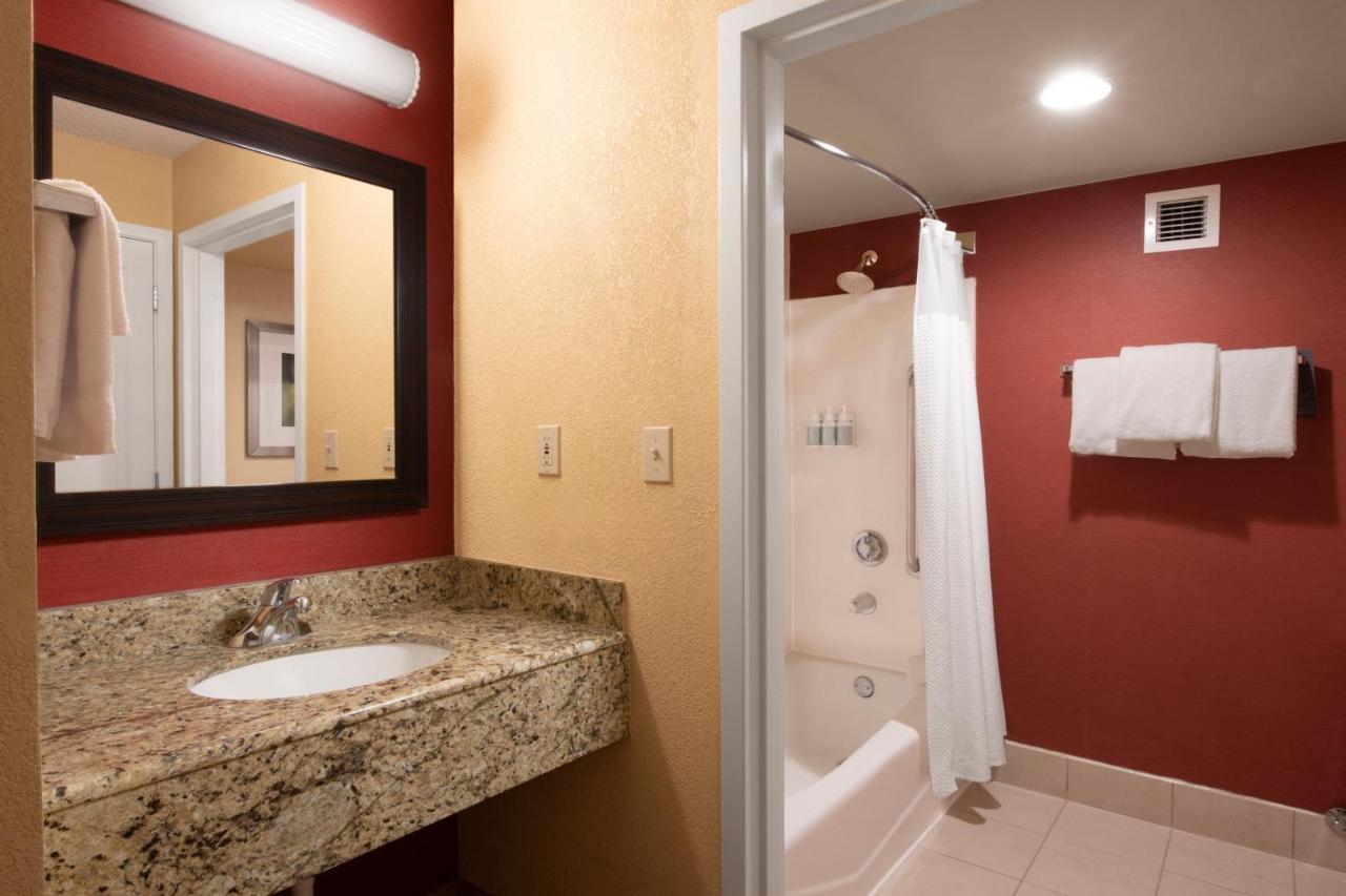 King Room with Sofa Bed and Balcony at Courtyard by Marriott Dallas Plano in Legacy Park