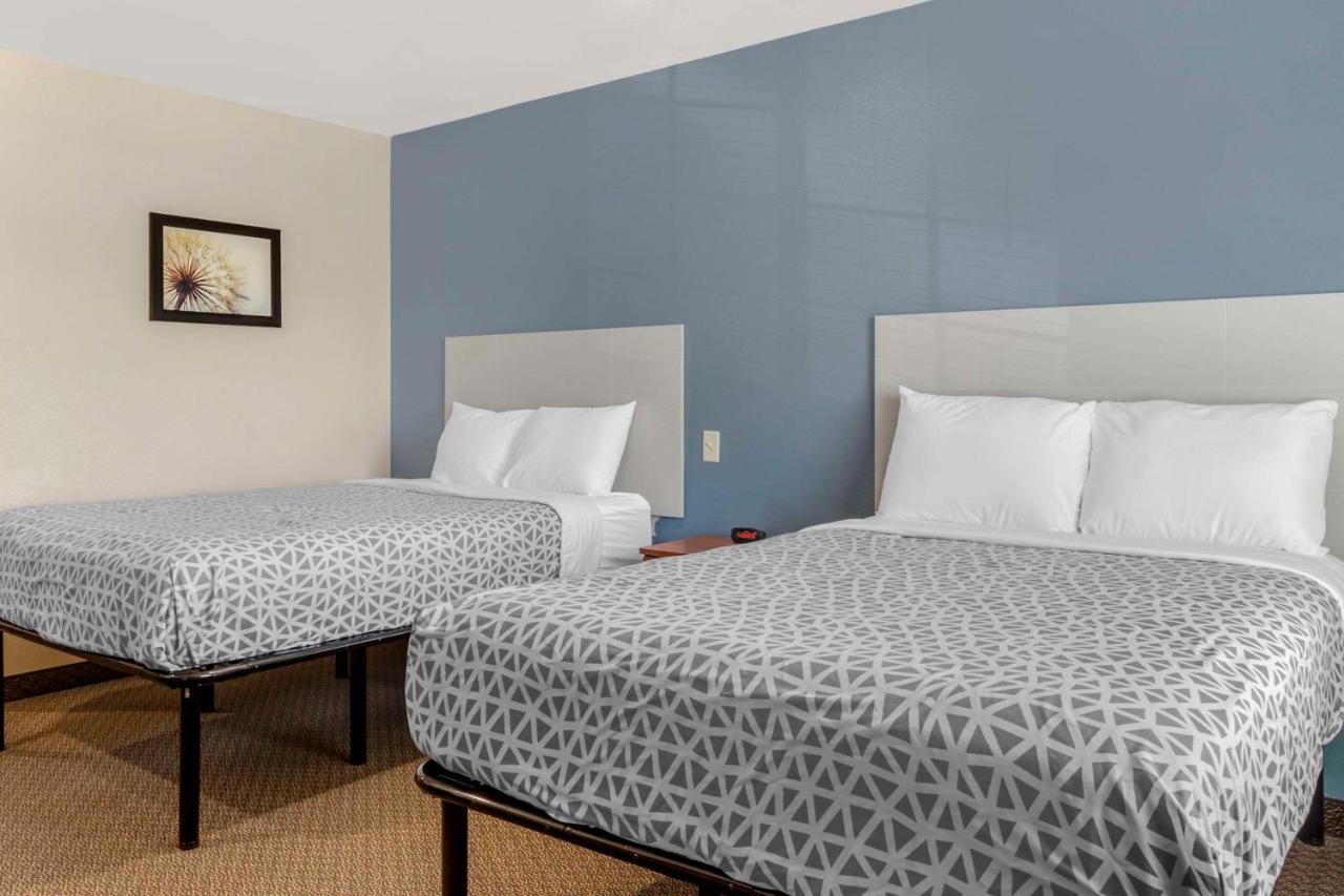 Double Room with Two Double Beds - Smoking at WoodSpring Suites Raleigh Garner