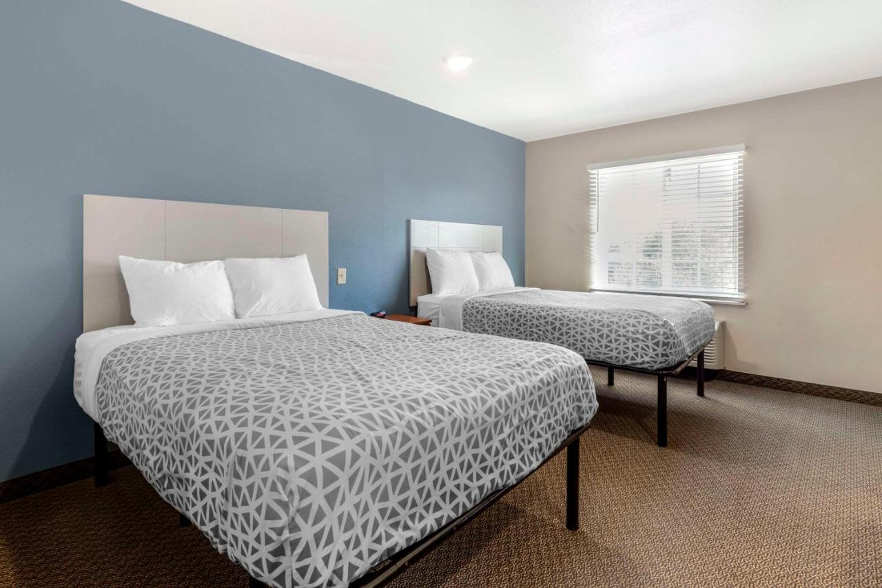 Double Room with Two Double Beds - Smoking at WoodSpring Suites Raleigh Garner