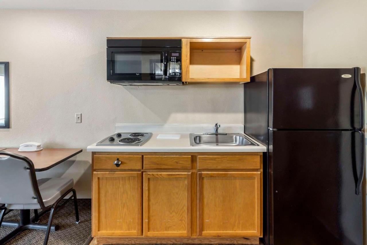 Double Room with Two Double Beds - Smoking at WoodSpring Suites Raleigh Garner
