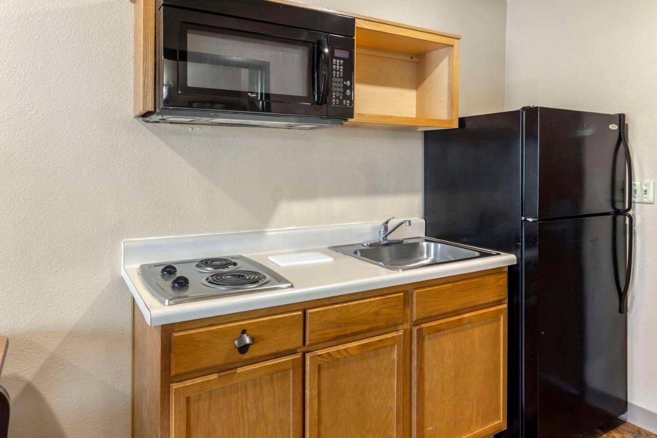Double Room with Two Double Beds - Smoking at WoodSpring Suites Raleigh Garner