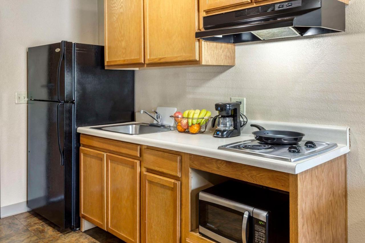 Queen Room - Accessible/Non-Smoking at WoodSpring Suites Raleigh Garner