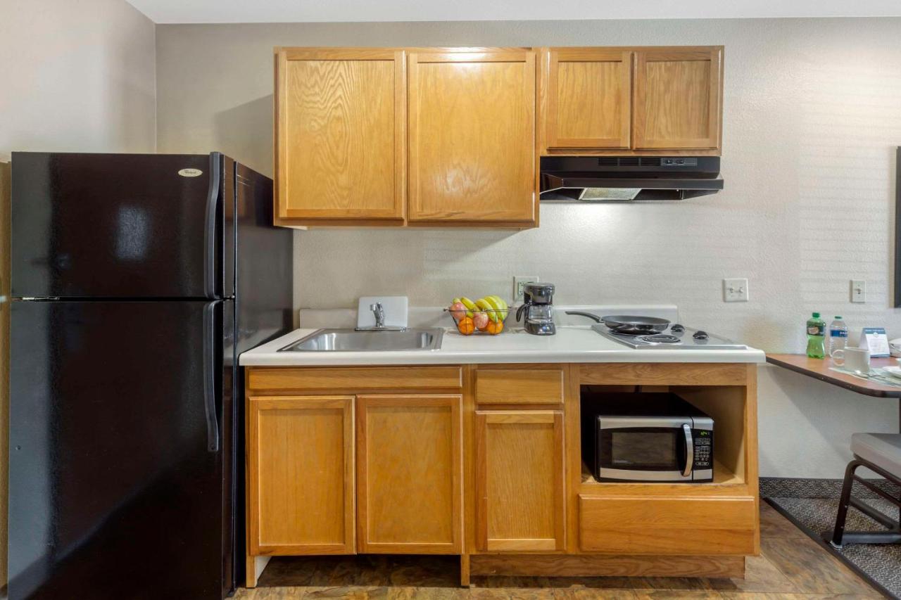 Queen Room - Accessible/Non-Smoking at WoodSpring Suites Raleigh Garner