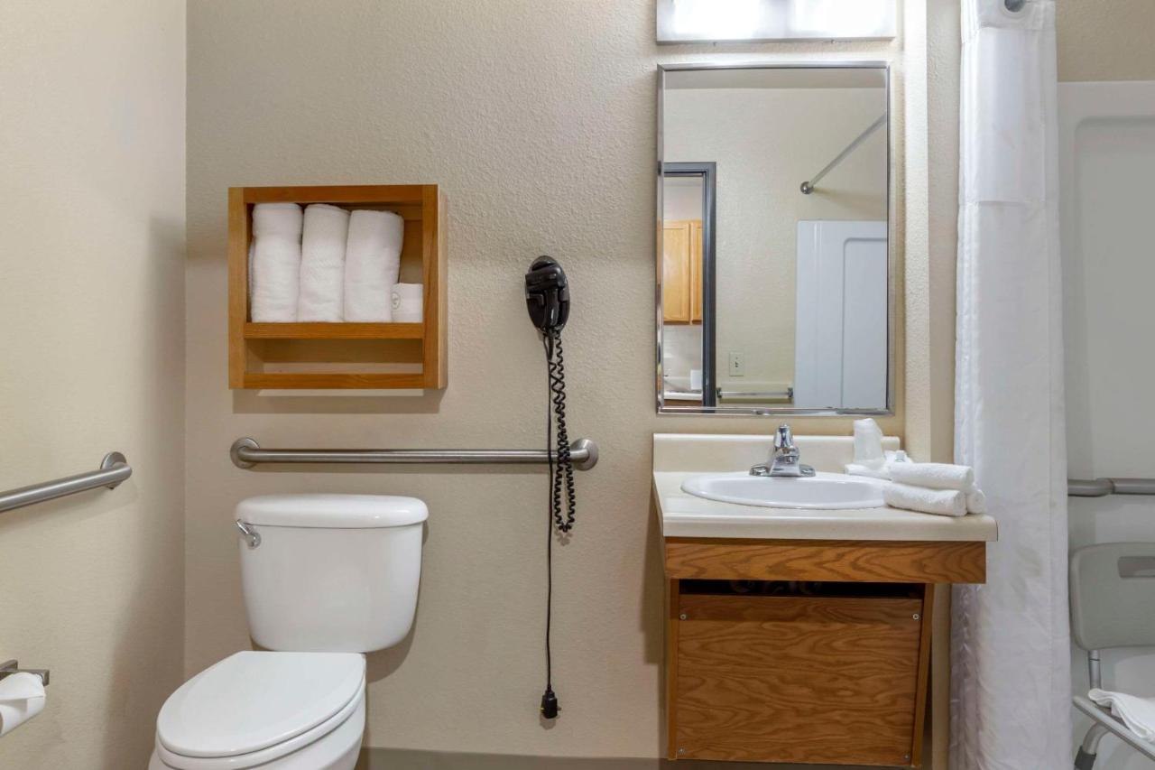 Queen Room - Accessible/Non-Smoking at WoodSpring Suites Raleigh Garner