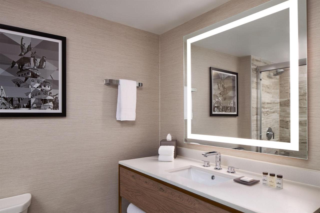Deluxe King Studio with Sofa Bed - Hearing Accessible at Sheraton Richmond Airport Hotel