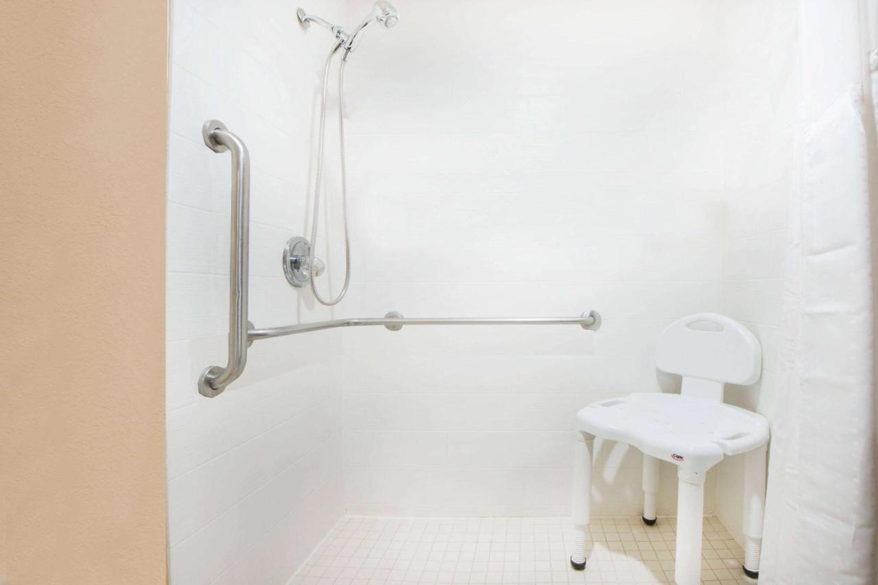 King Room with Roll-In Shower - Mobility/Hearing Accessible - Non-Smoking at Travelodge by Wyndham Enid