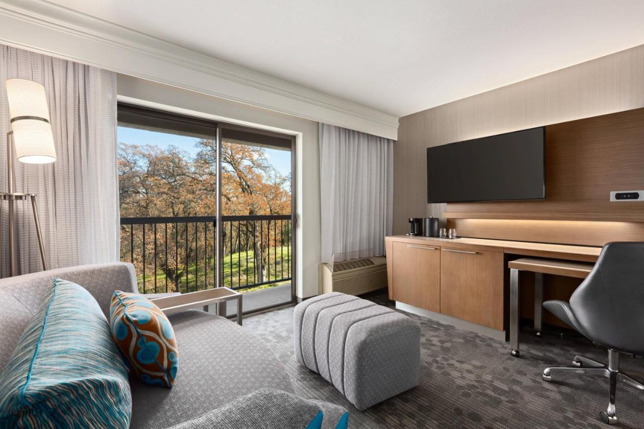 King Room with Sofa Bed and Balcony at Courtyard by Marriott Roseville
