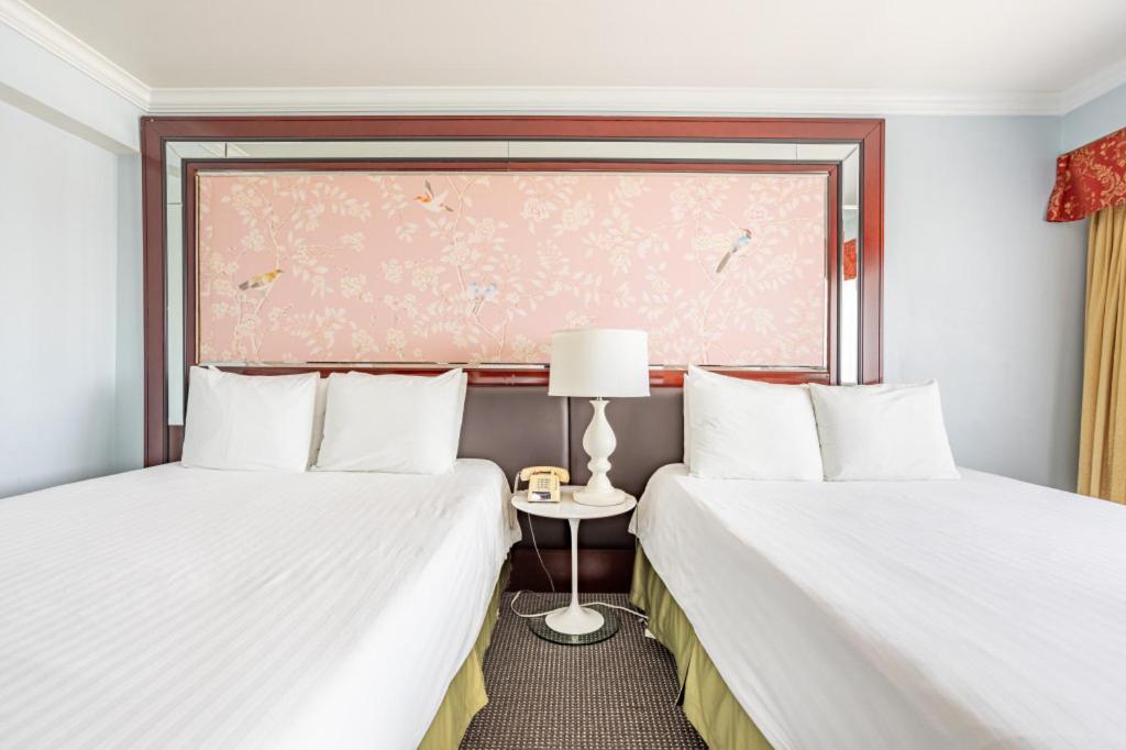 Queen Room with Two Queen Beds at Hotel Koxie
