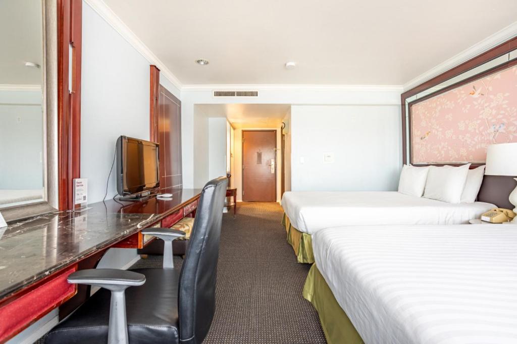 Queen Room with Two Queen Beds at Hotel Koxie