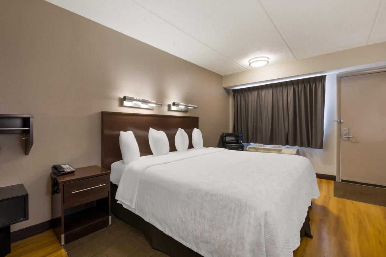 Deluxe King Room Disability Access Smoke Free at Red Roof Inn PLUS+ Nashville Airport
