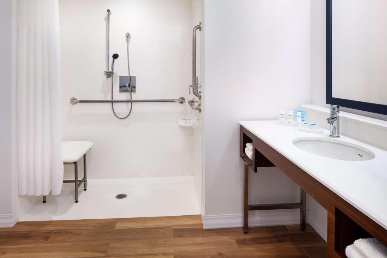 Queen Room with Two Queen Beds with Sofa Bed and Water View - Mobility Accessible at Hampton by Hilton at the Boston Seaport District