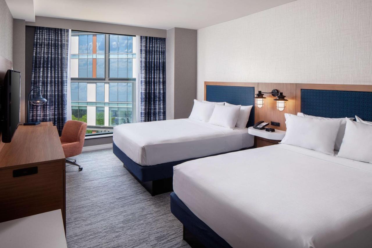 Queen Room with Two Queen Beds and Bath Tub - Mobility Access at Hampton by Hilton at the Boston Seaport District
