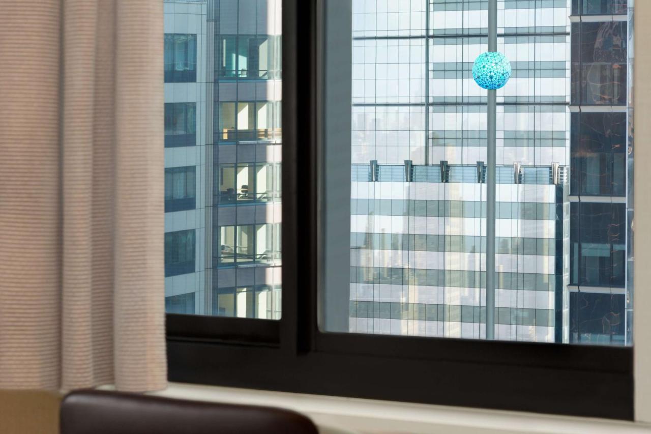 Deluxe Queen Room with Two Queen Beds and Times Square View at Hilton New York Times Square