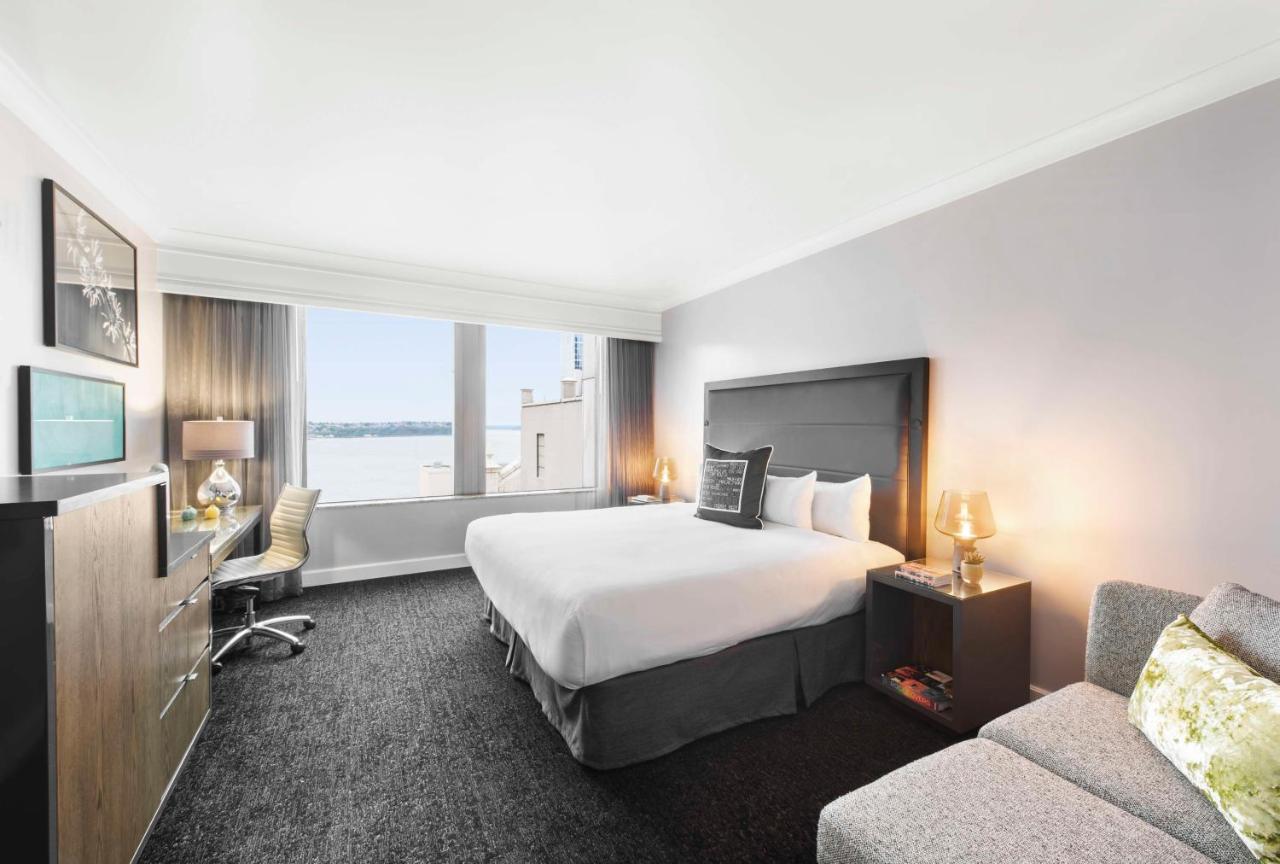 King Room with Partial Water and Skyline View at Hilton Motif Seattle