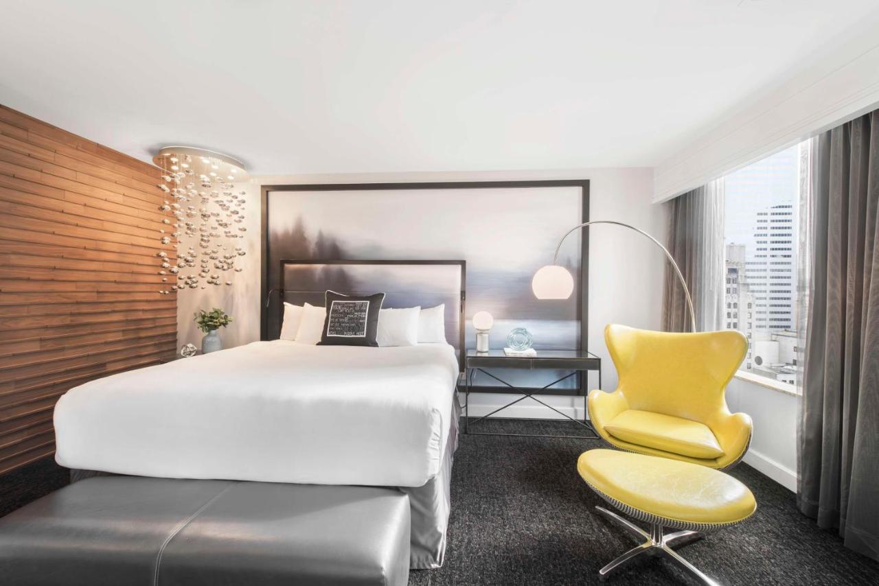 King Suite with Water and Skyline View at Hilton Motif Seattle
