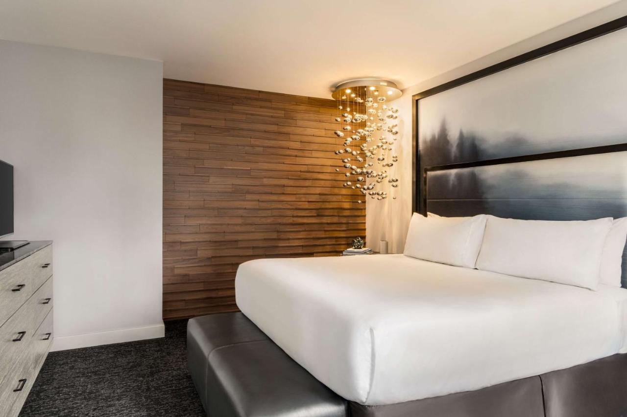 King Suite with Water and Skyline View at Hilton Motif Seattle