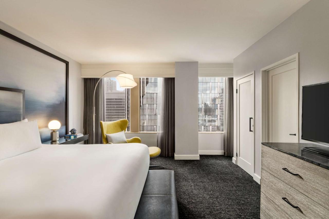 King Suite with Water and Skyline View at Hilton Motif Seattle