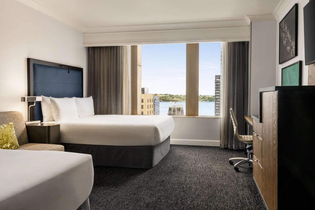 Queen Room with Two Queen Beds - Partial Water and Skyline View at Hilton Motif Seattle