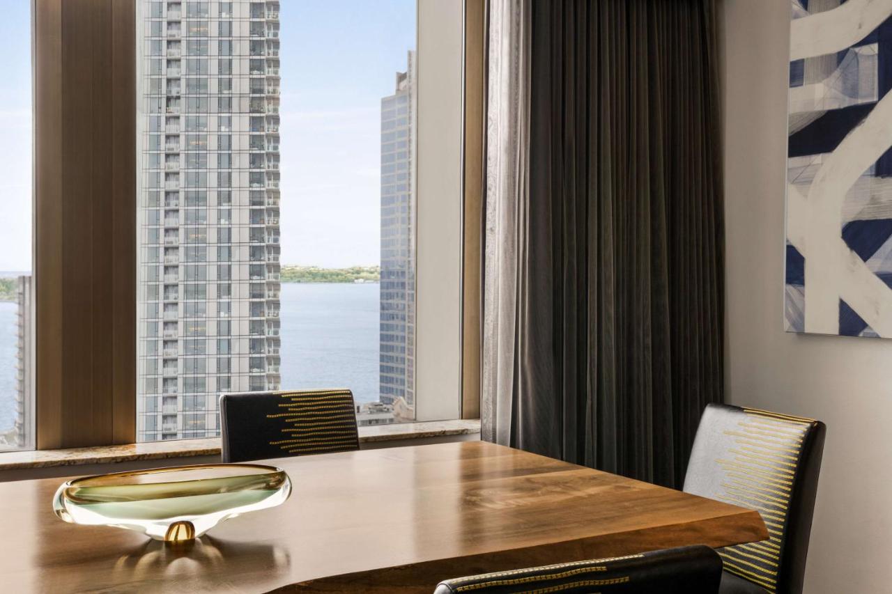 King Suite with Water and Skyline View at Hilton Motif Seattle
