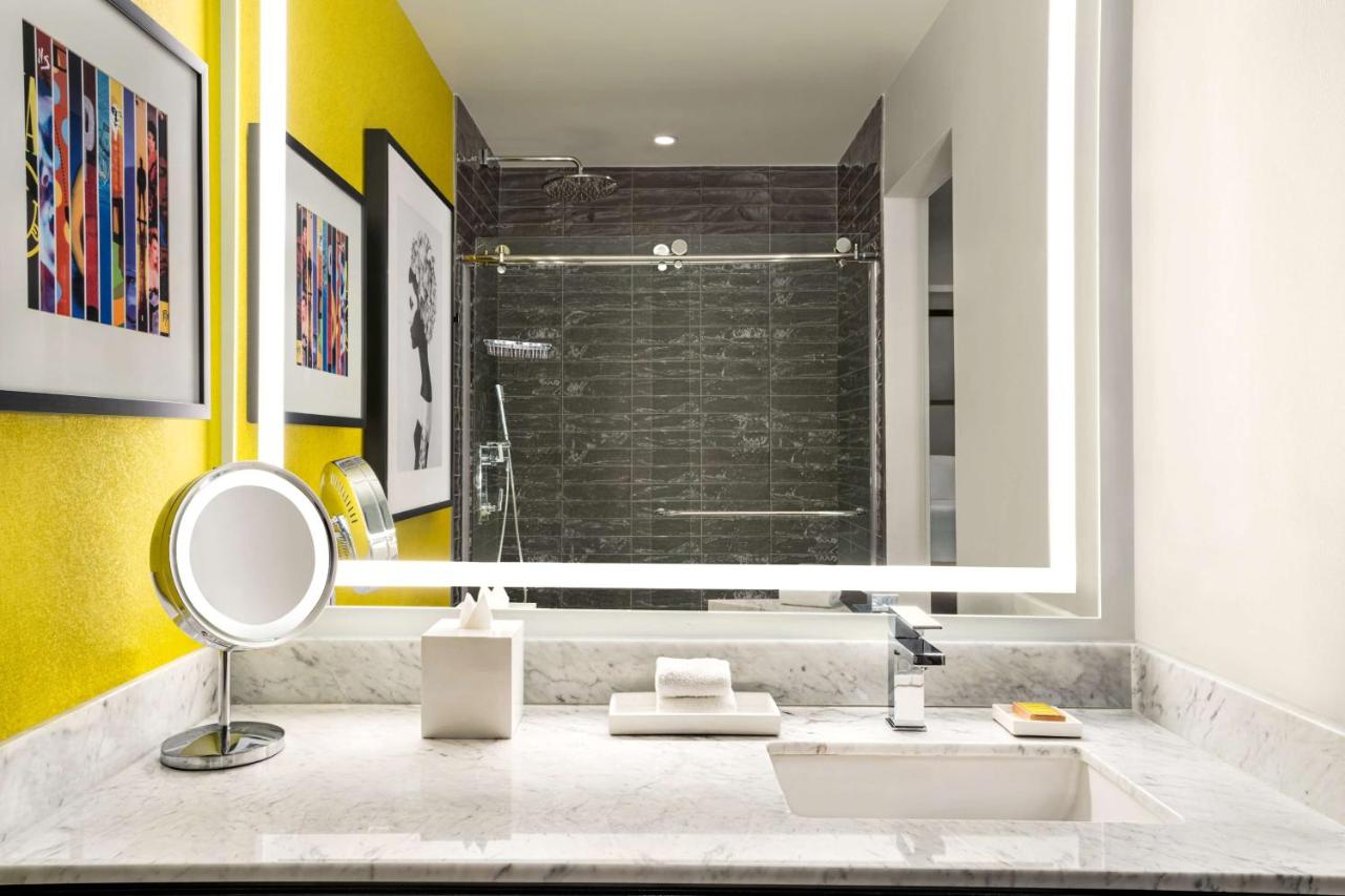 King Suite with Water and Skyline View at Hilton Motif Seattle