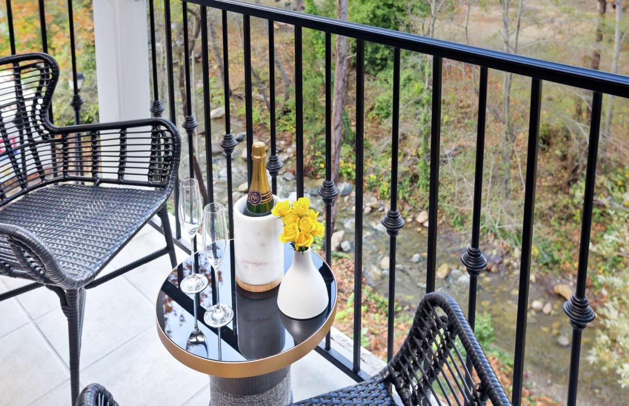 Corner King Suite with Soaking Tub & Balcony at The Inn at Saratoga, Tapestry Collection by Hilton
