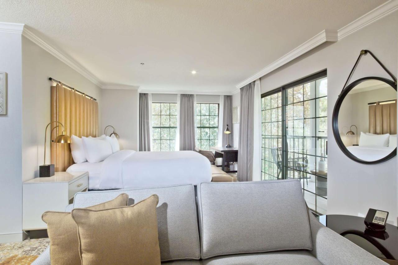 Junior King Suite with Balcony at The Inn at Saratoga, Tapestry Collection by Hilton