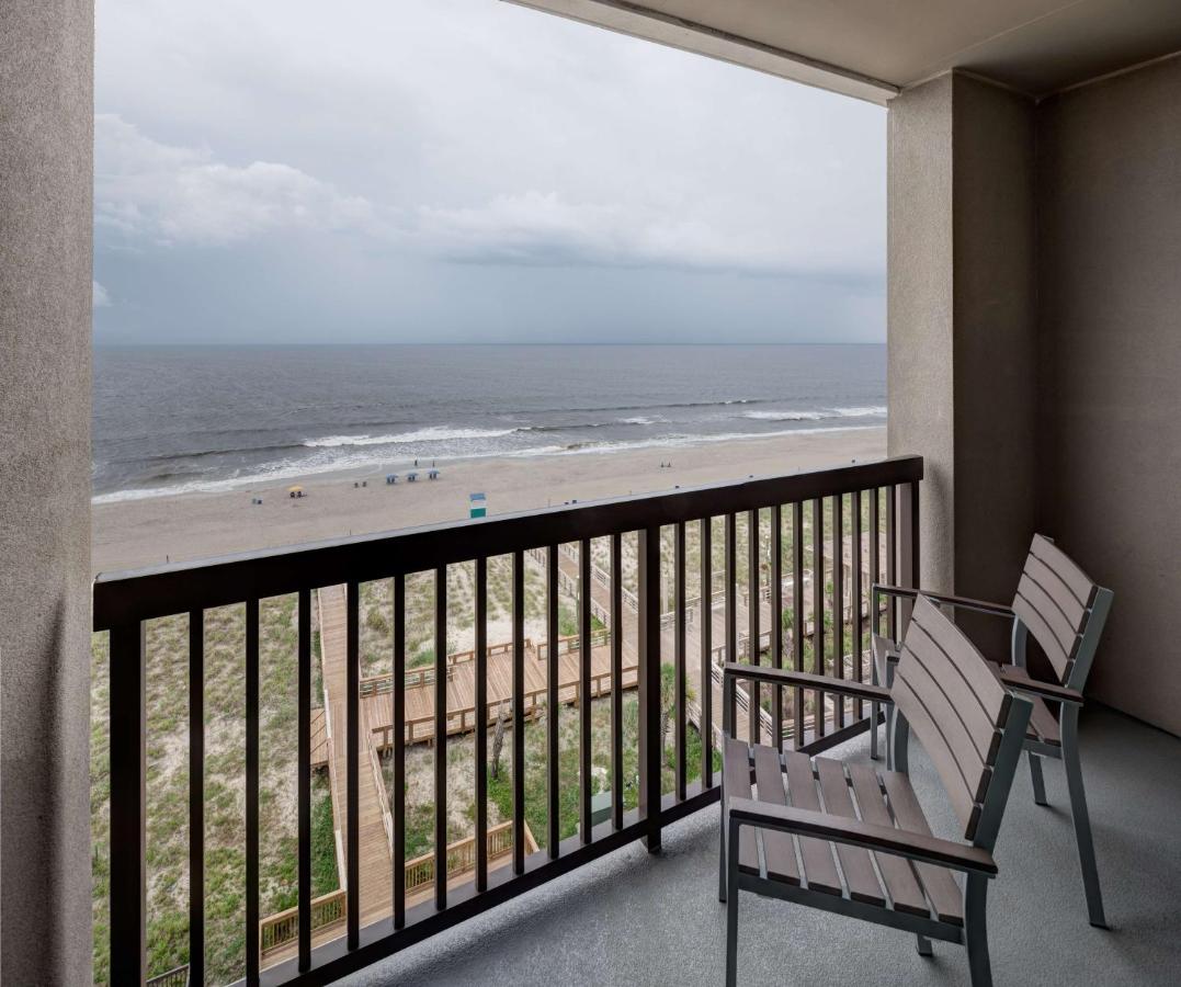 Queen Room with Balcony - Ocean Front/Hearing Accessible at Hampton Inn & Suites Carolina Beach Oceanfront