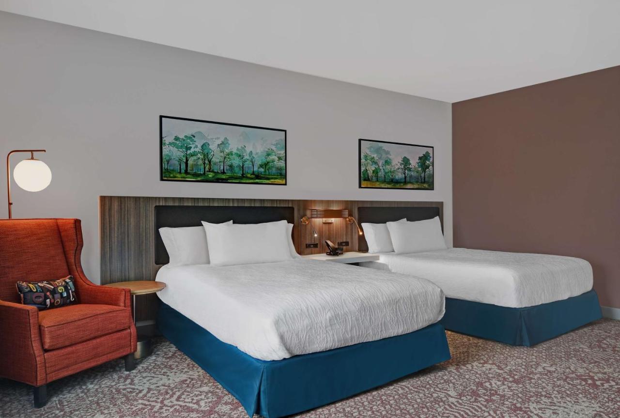 Deluxe Queen Room with Two Queen Beds and Balcony at Hilton Garden Inn Madison Huntsville Airport