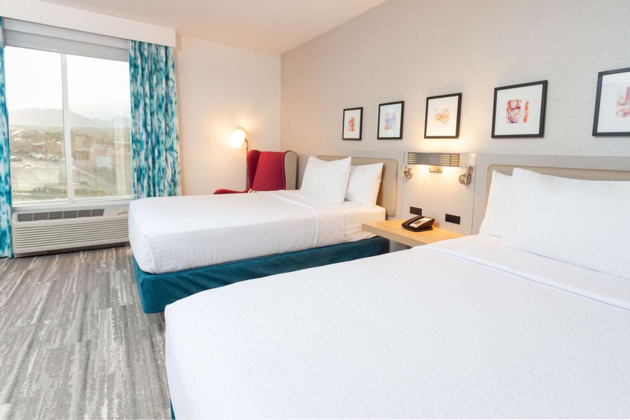 Queen Room with Two Queen Beds and Mountain View at Hilton Garden Inn Broomfield Boulder