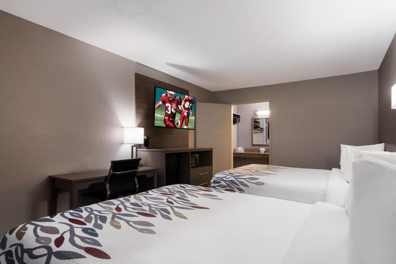 Superior Room with Two Queen Beds Disability Access Roll-In Shower Non-Smoking at Red Roof Inn Vero Beach - I-95