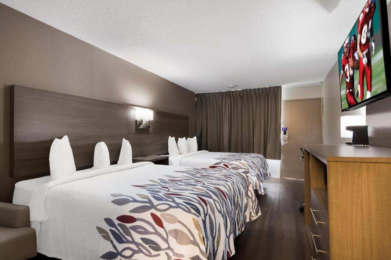 Superior Room with Two Queen Beds Disability Access Roll-In Shower Non-Smoking at Red Roof Inn Vero Beach - I-95