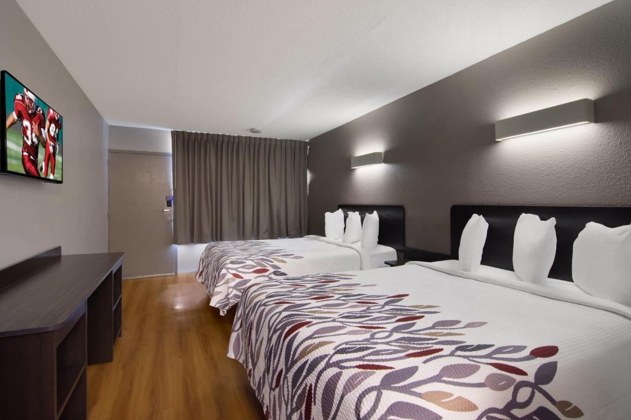 Deluxe Room with Two Queen Beds Non-Smoking at Red Roof Inn Vero Beach - I-95