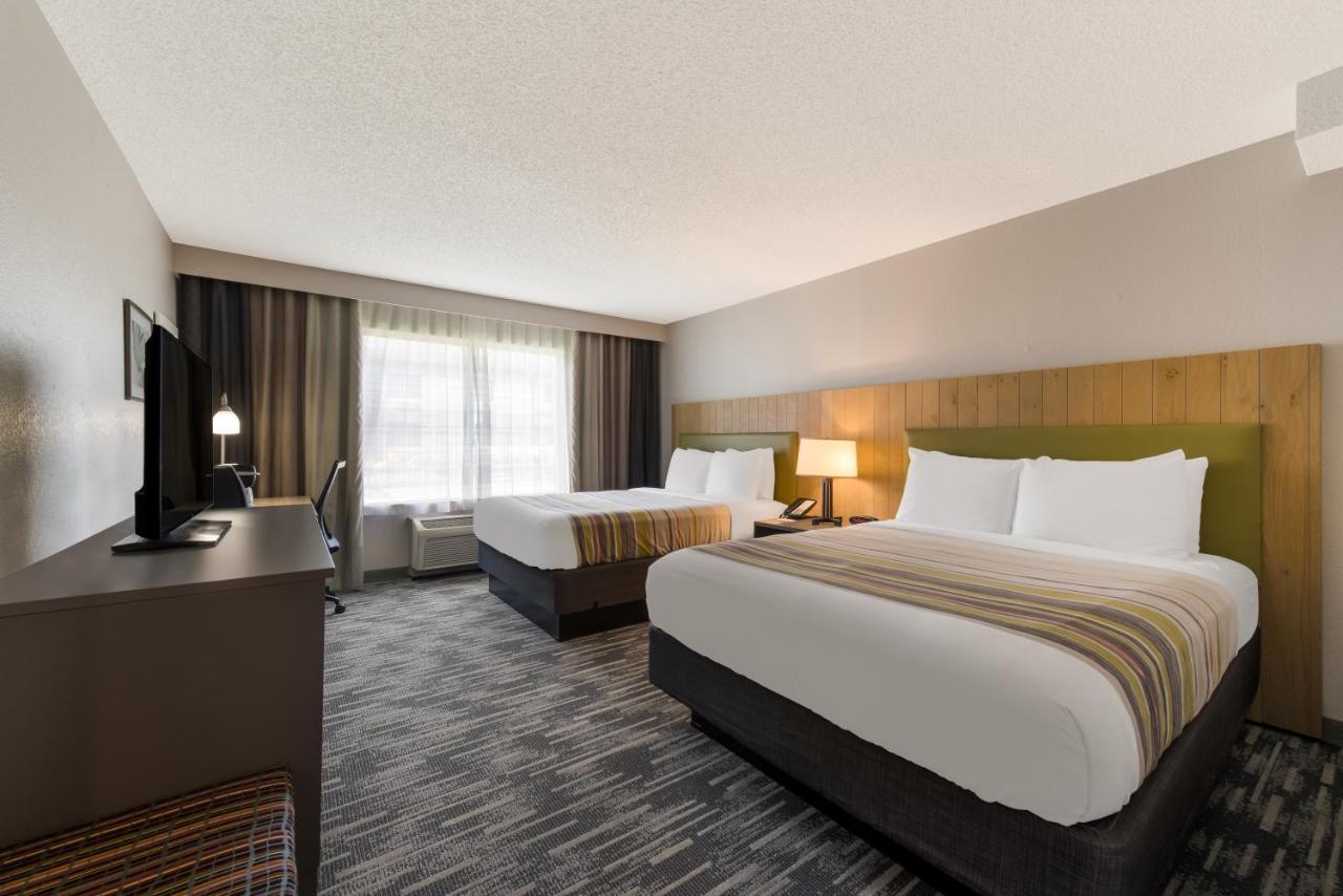 Queen Room with Two Queen Beds - Non-Smoking at Country Inn & Suites by Radisson, Wichita East, KS
