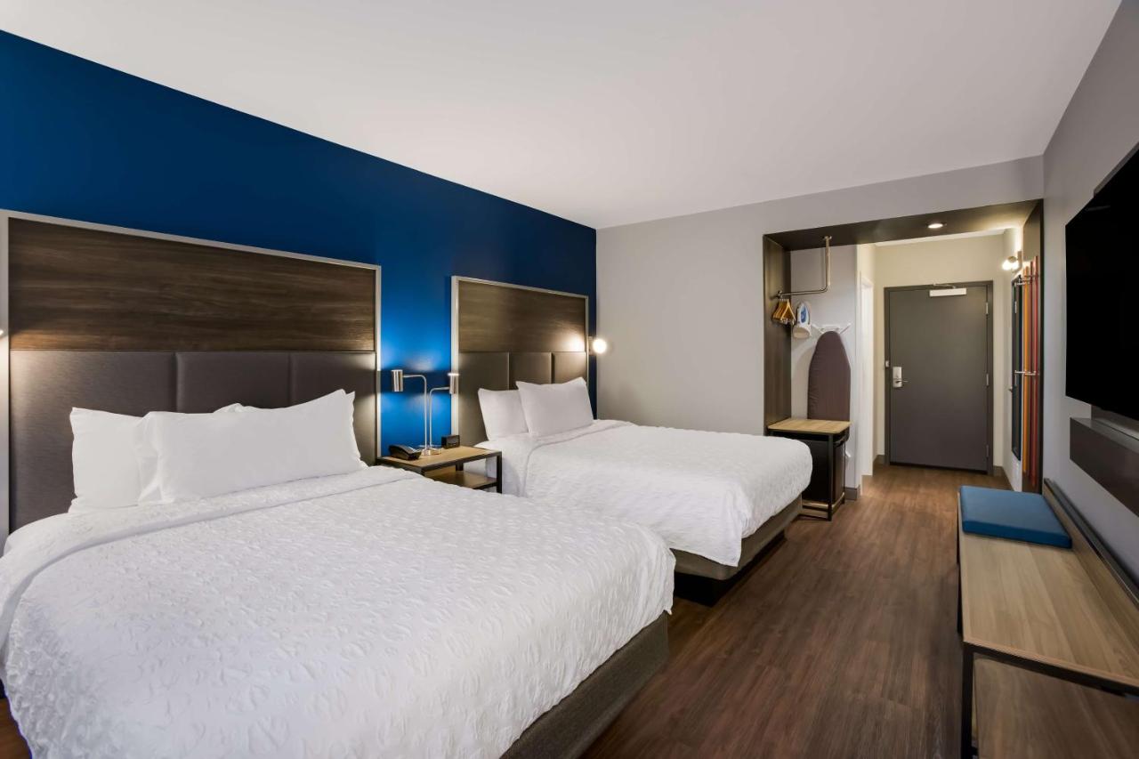Queen Room with Two Queen Beds and Walk In Shower at Tru By Hilton Traverse City