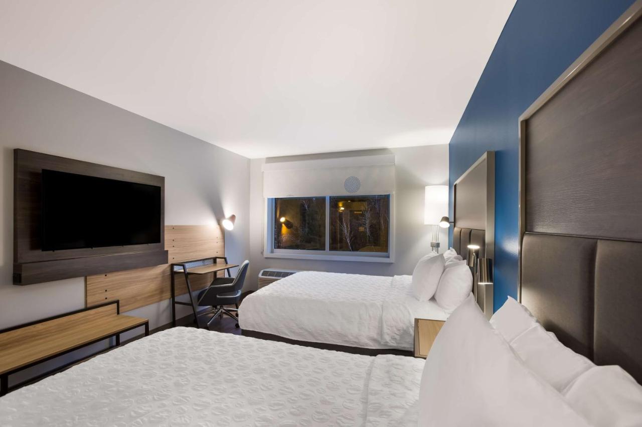 Queen Room with Two Queen Beds and Walk In Shower at Tru By Hilton Traverse City