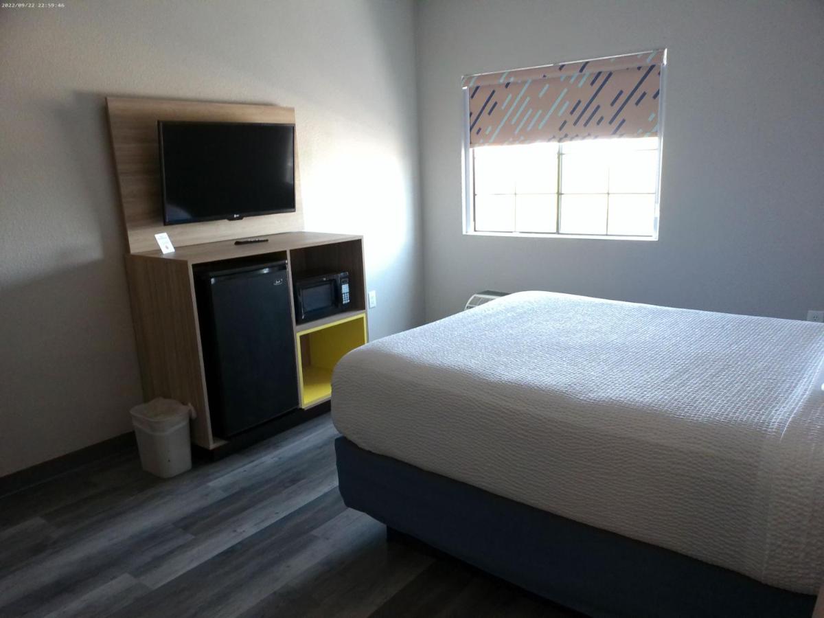 Suite One Bedroom with Three Queen Beds - Non-Smoking at Days Inn & Suites by Wyndham Tucson/Marana