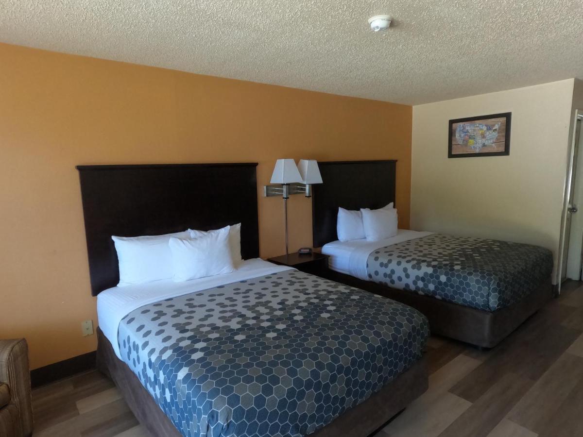 Queen Room with Two Queen Beds - Smoking at Econo Lodge Inn & Suites San Antonio near Frost Bank Center