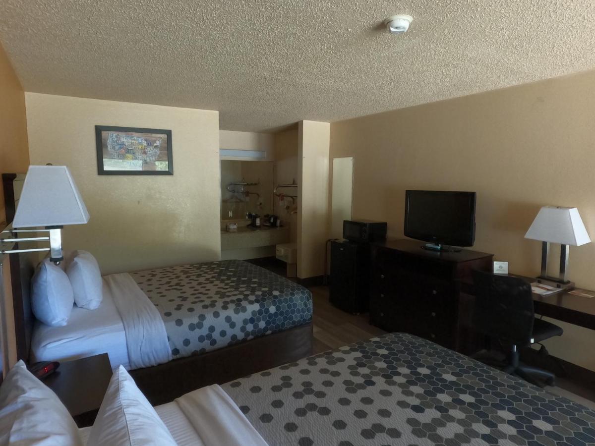 Queen Room with Two Queen Beds - Non-Smoking at Econo Lodge Inn & Suites San Antonio near Frost Bank Center