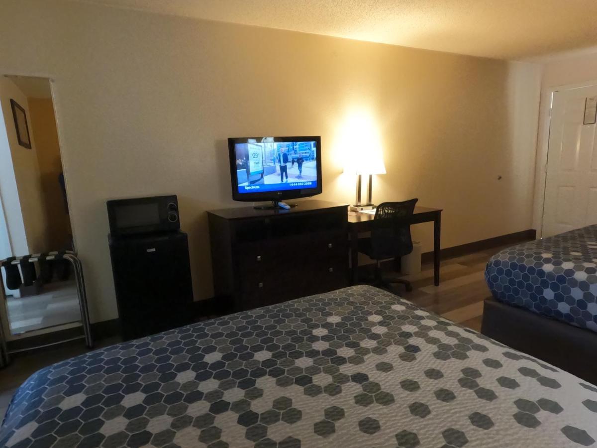 Queen Room with Two Queen Beds - Non-Smoking at Econo Lodge Inn & Suites San Antonio near Frost Bank Center