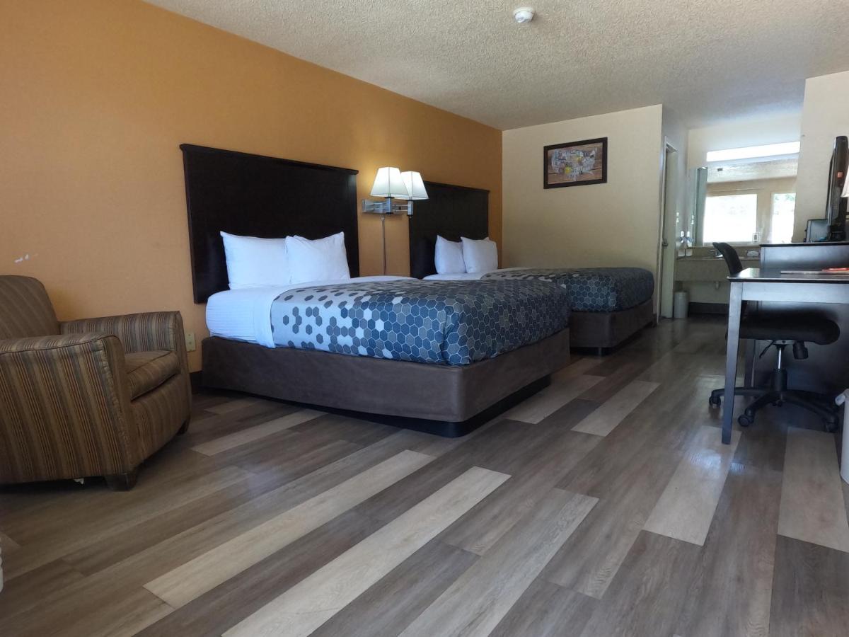 Queen Room with Two Queen Beds - Smoking at Econo Lodge Inn & Suites San Antonio near Frost Bank Center