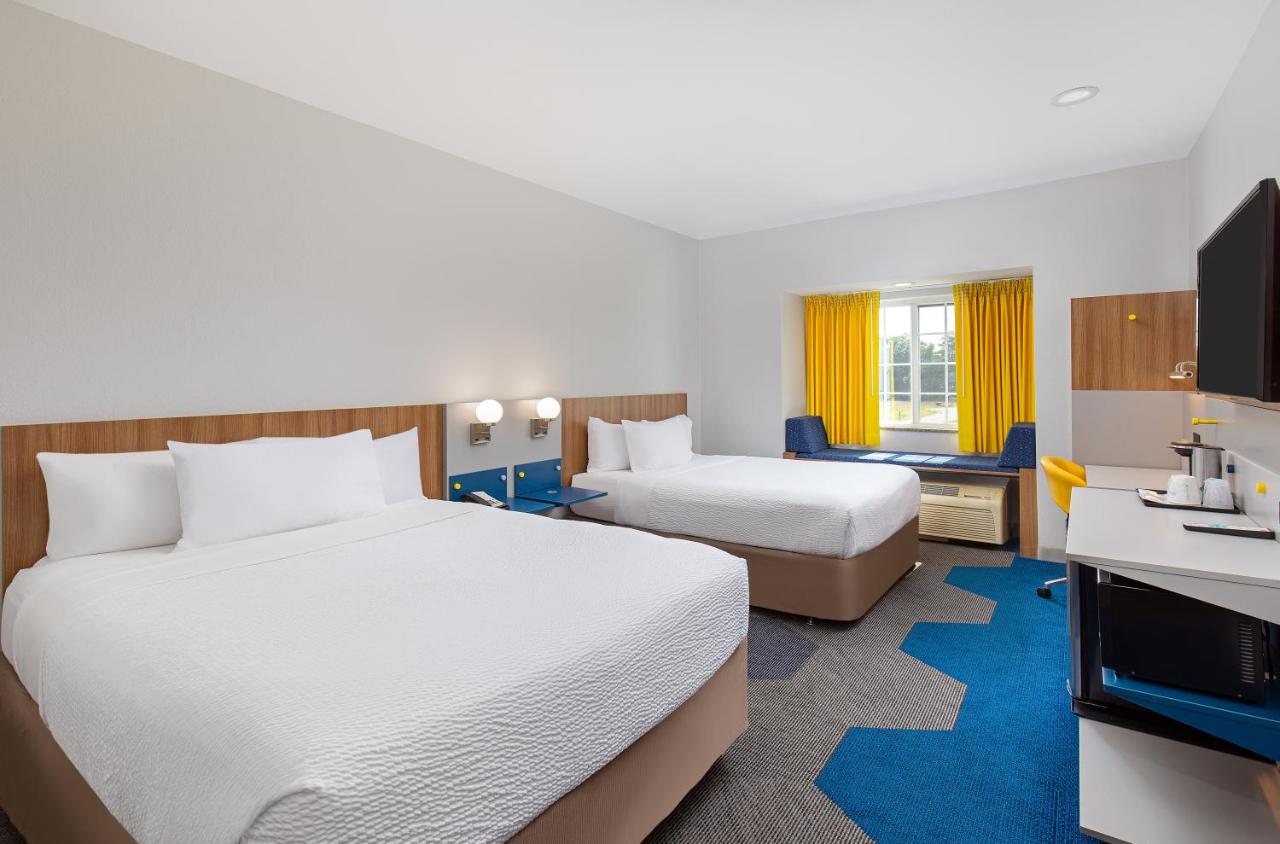 Deluxe Queen Room with Two Queen Beds - Disability Access - Non-Smoking at Microtel Inn and Suites by Wyndham Columbus North