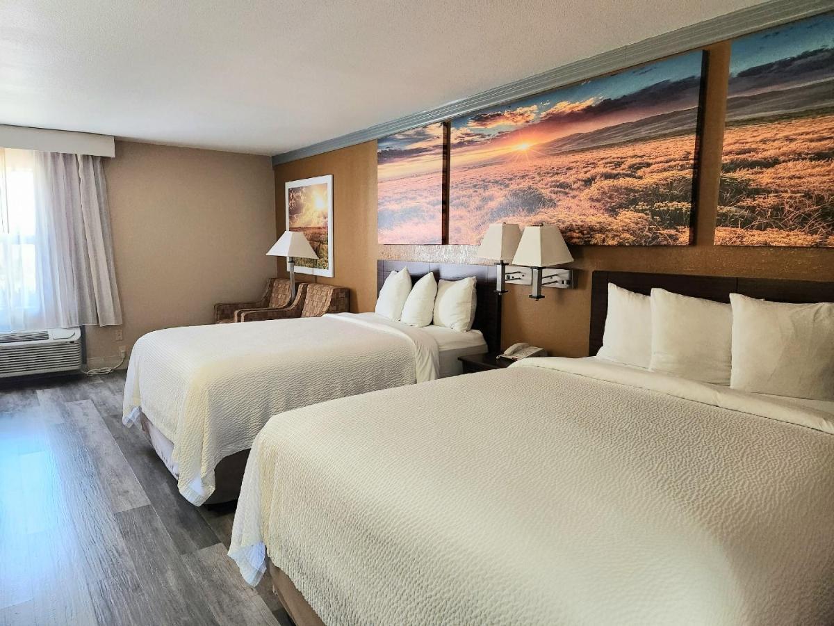 Queen Room with Two Queen Beds and Roll-In Shower - Mobility/Hearing Accessible - Non-Smoking at Days Inn by Wyndham Rosenberg